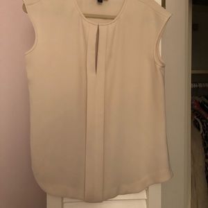 White sleeveless top